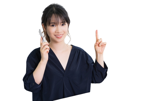 指を指す女性の写真